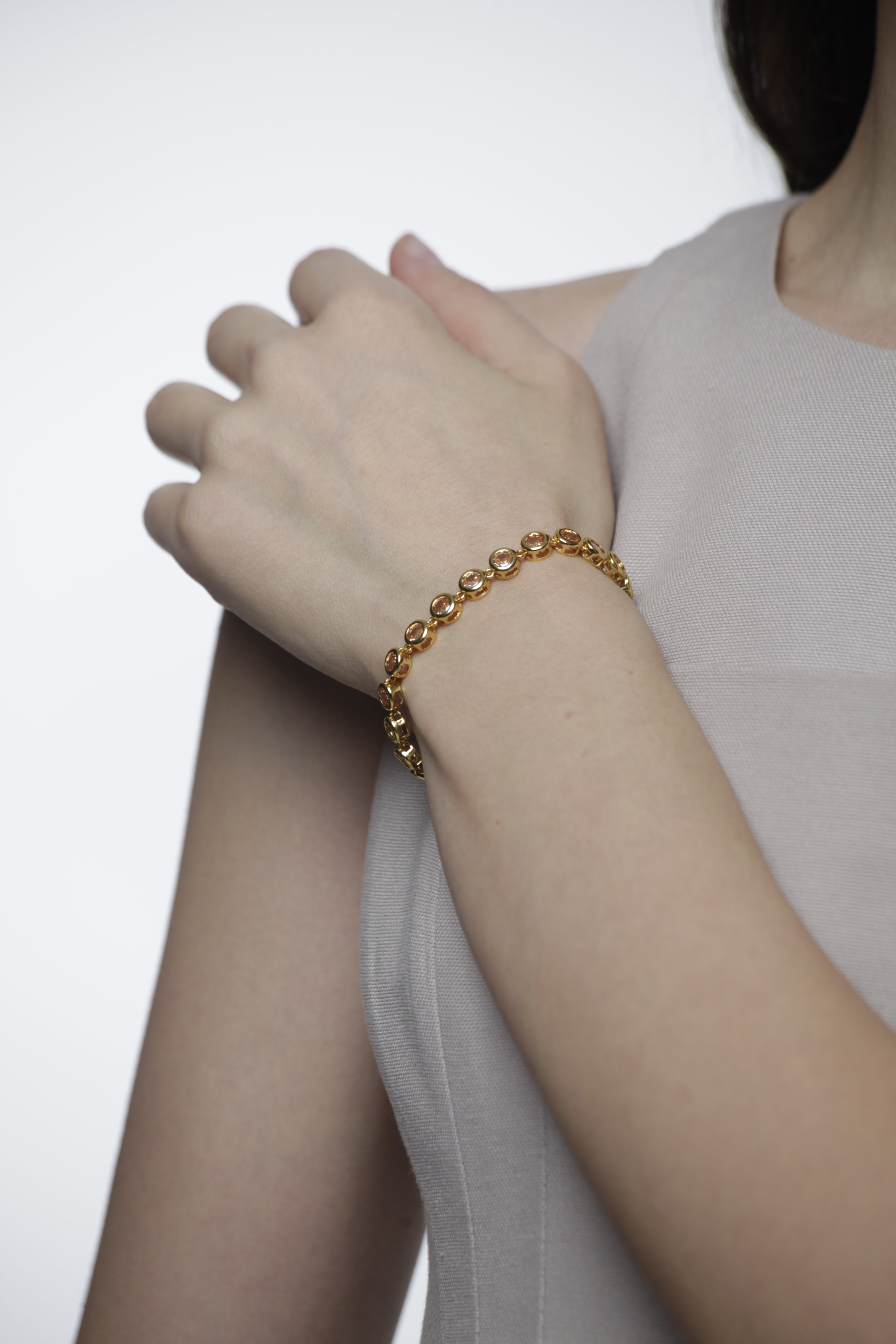 Round Bezel Set eternity bracelet in Amber